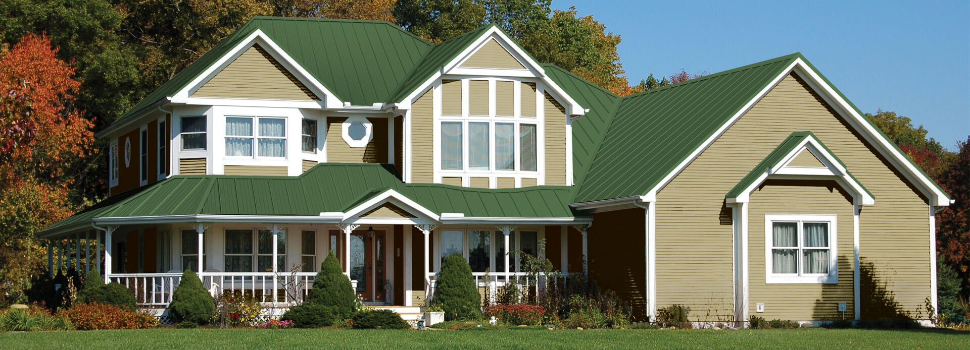 House With A Green Steel Roof